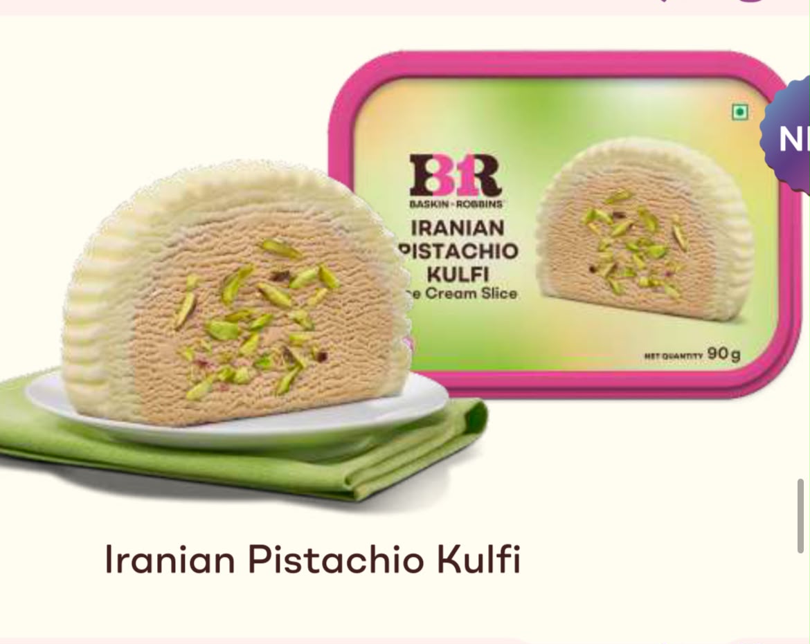 Iranian Pistachio Kulfi Roll Cake Slice